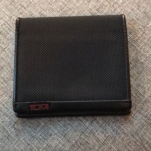 Tumi bifold wallet, with 8 card slots